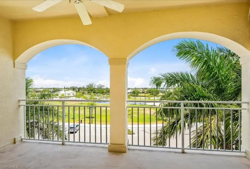 Balcony featuring ceiling fan